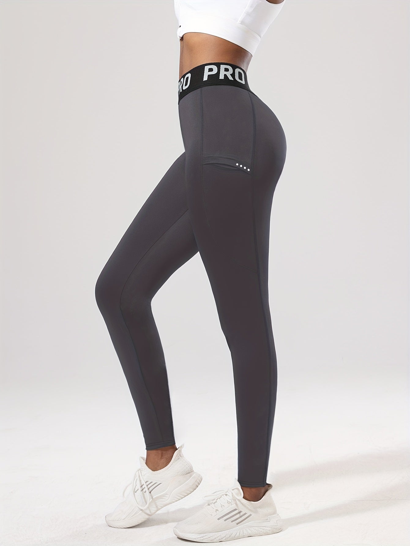 Legging de sport femme taille haute PRO avec poche latérale