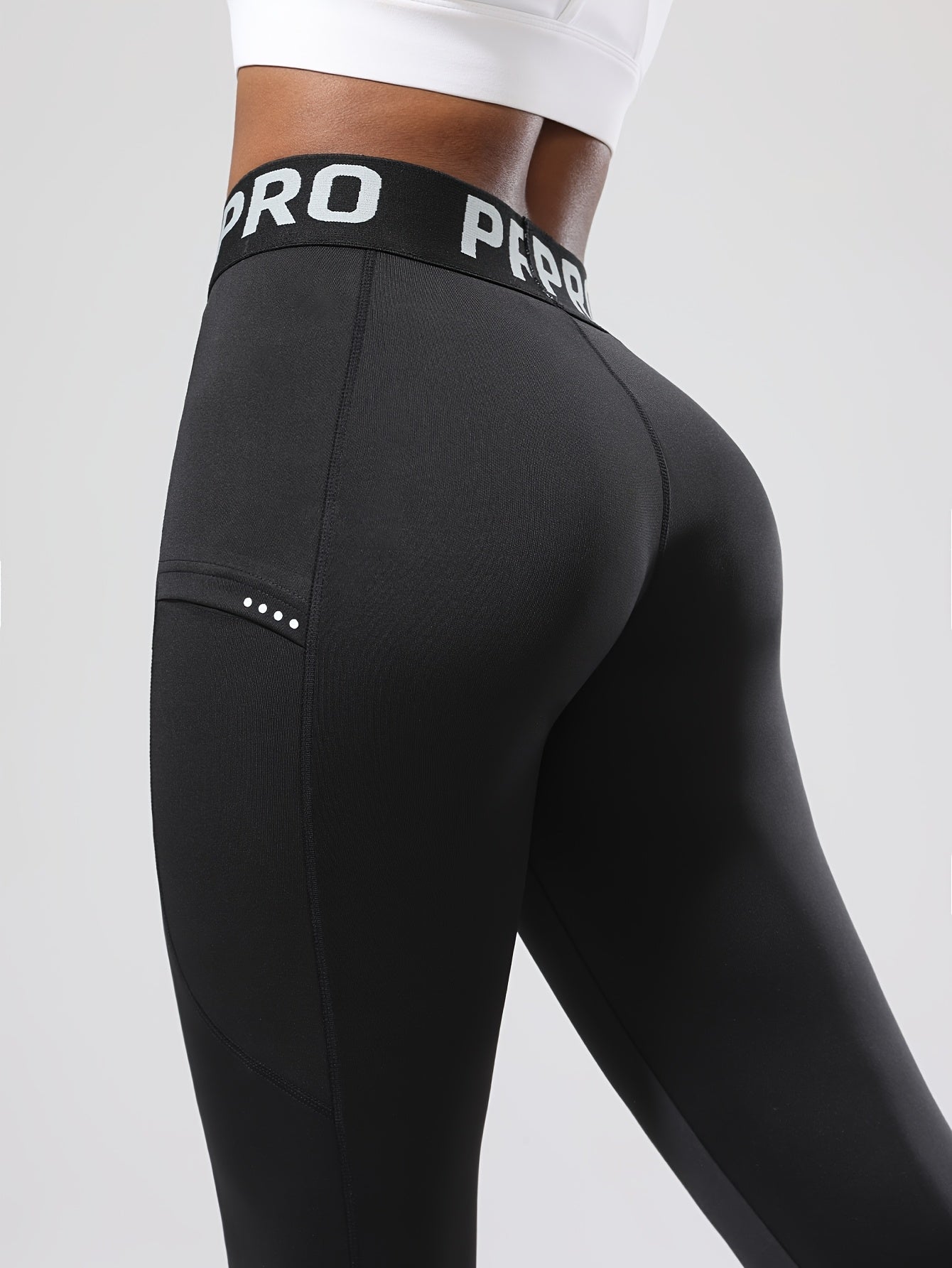 Legging de sport femme taille haute PRO avec poche latérale
