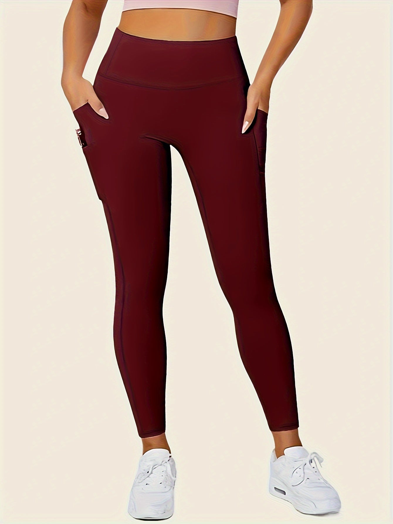 Legging sport femme taille haute avec poches latérales