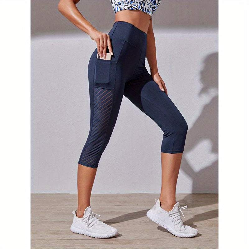 Legging de sport court taille haute avec poche latérale