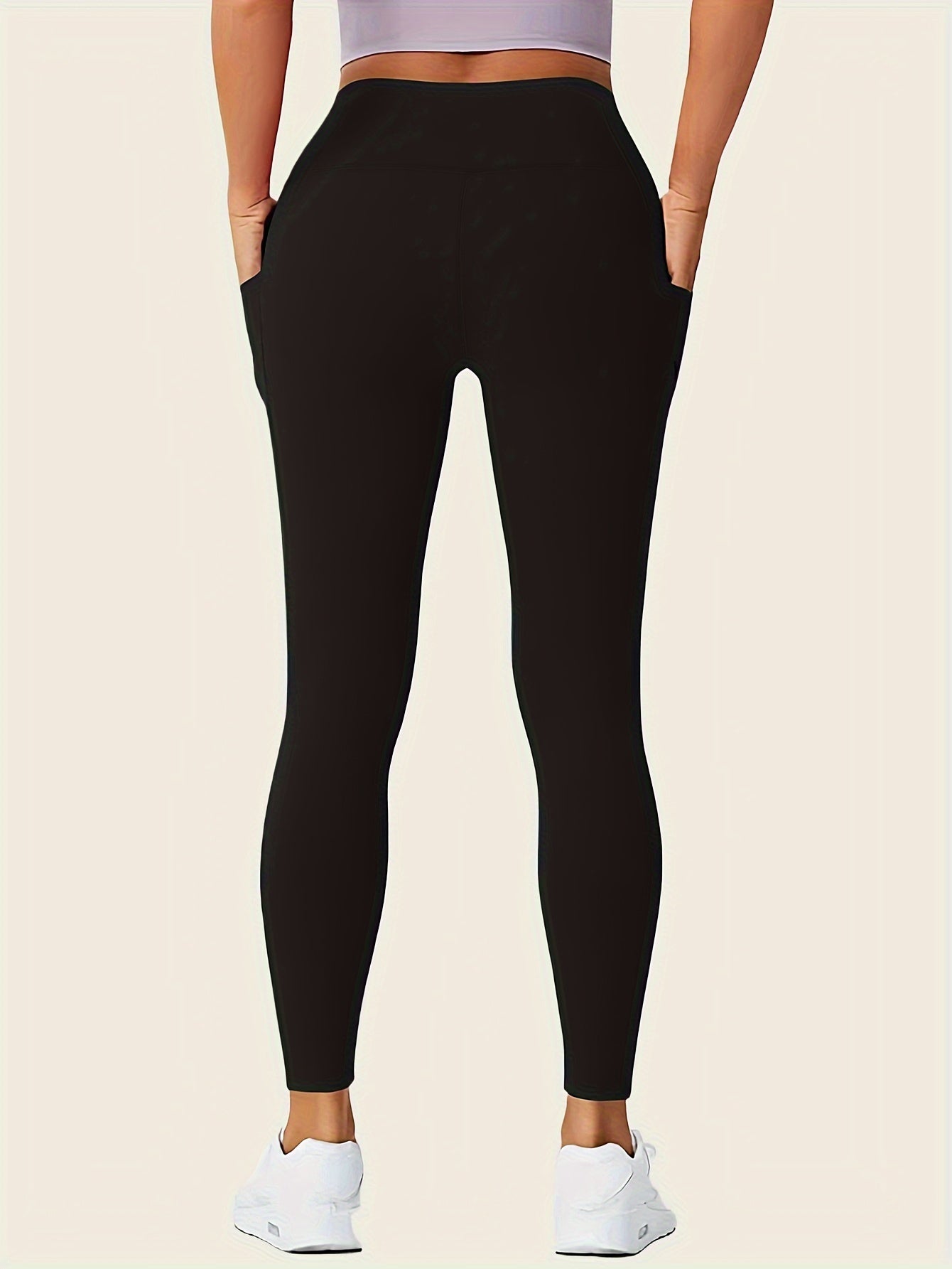 Legging sport femme taille haute avec poches latérales