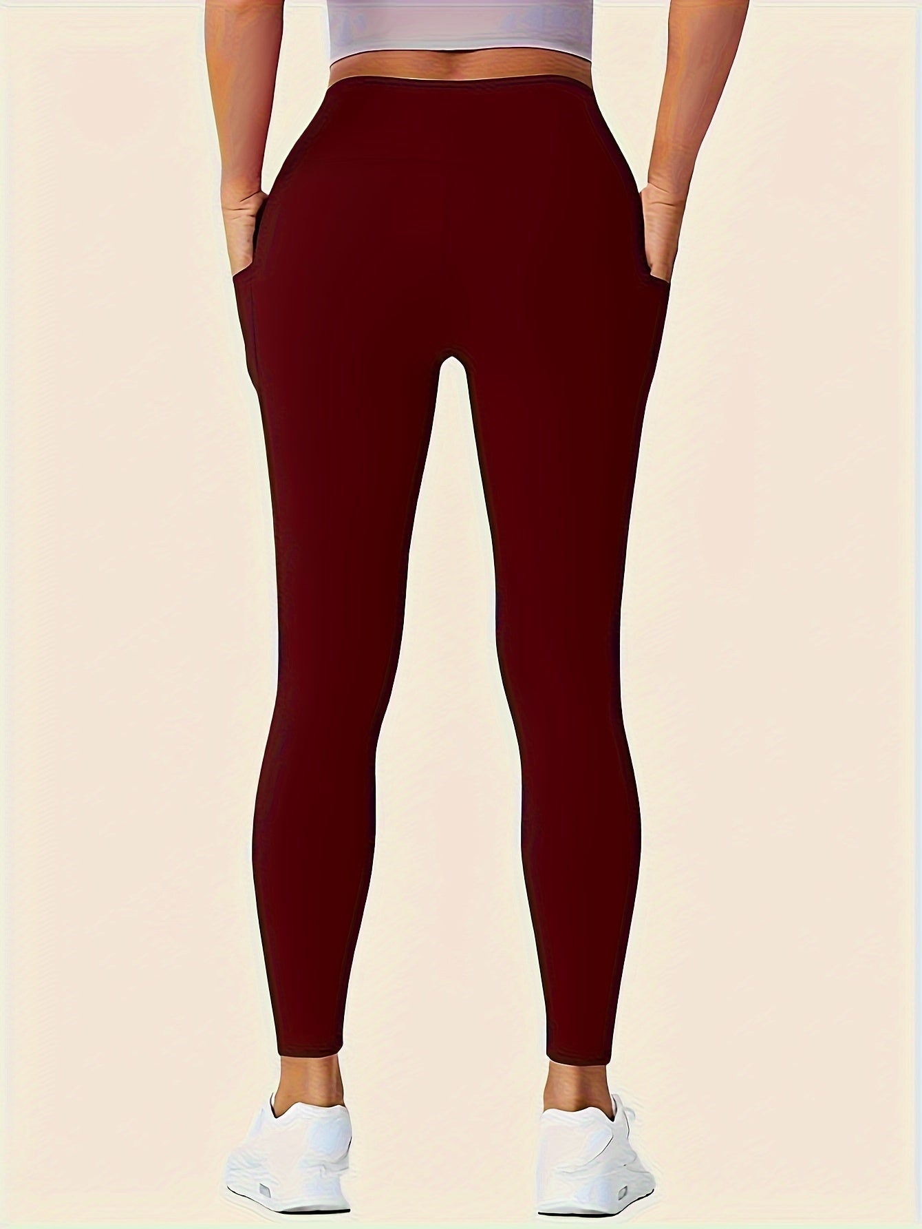 Legging sport femme taille haute avec poches latérales