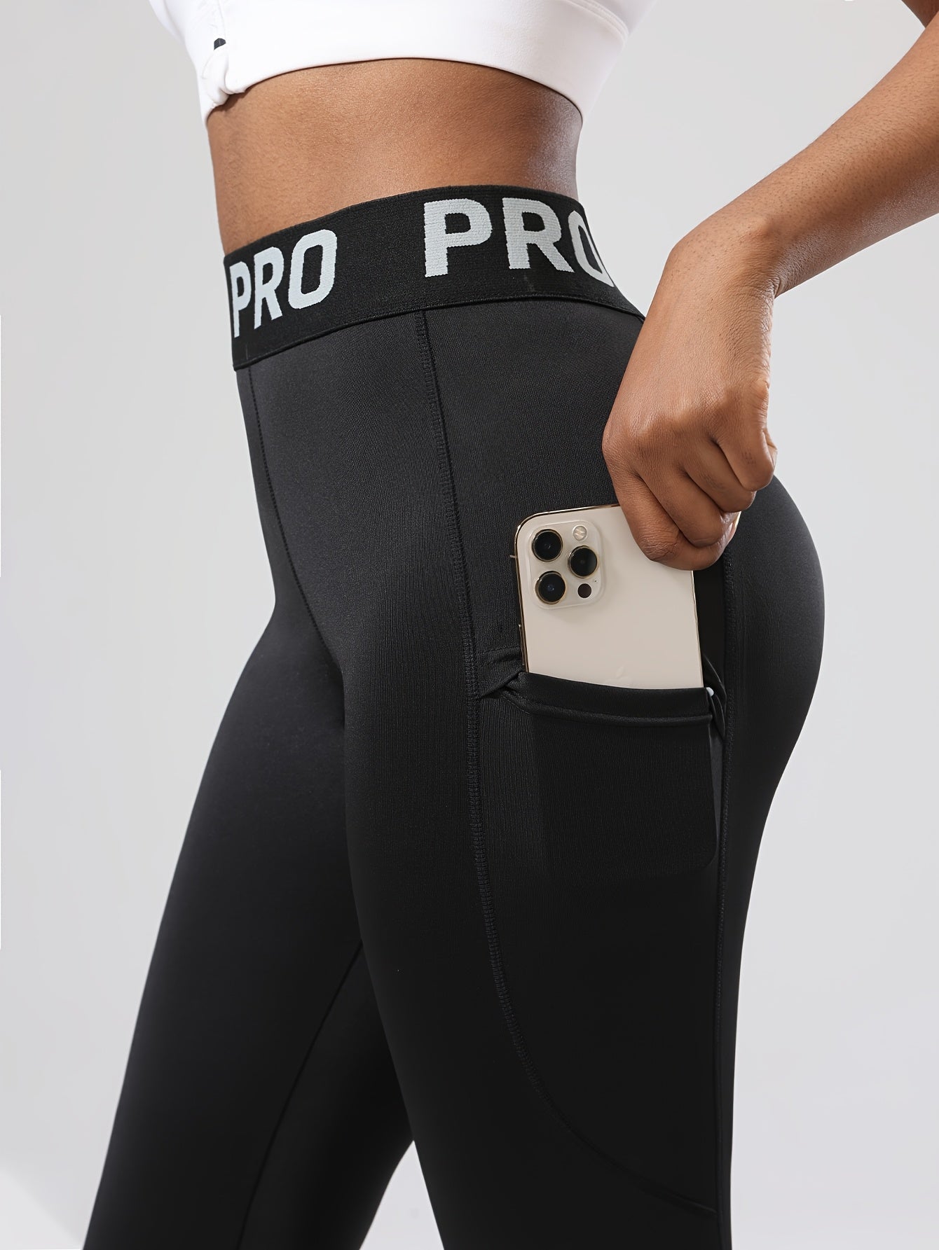 Legging de sport femme taille haute PRO avec poche latérale