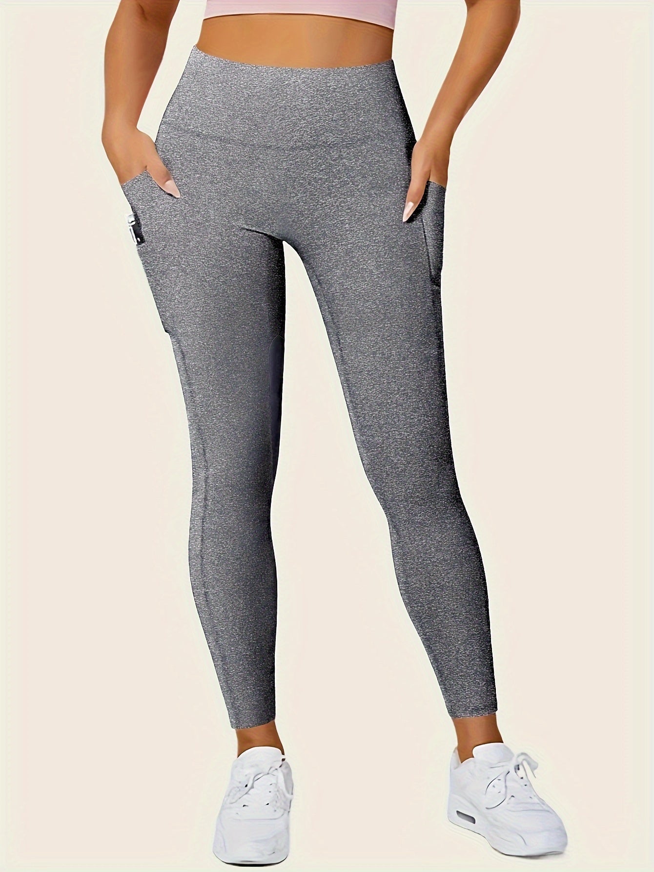 Legging sport femme taille haute avec poches latérales