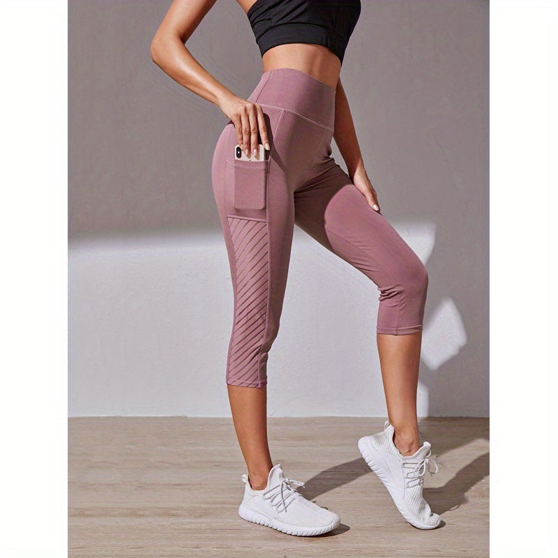 Legging de sport court taille haute avec poche latérale