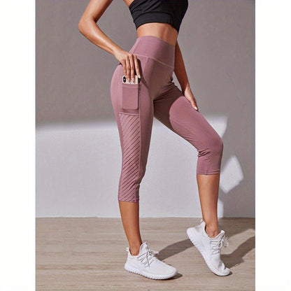 Legging de sport court taille haute avec poche latérale